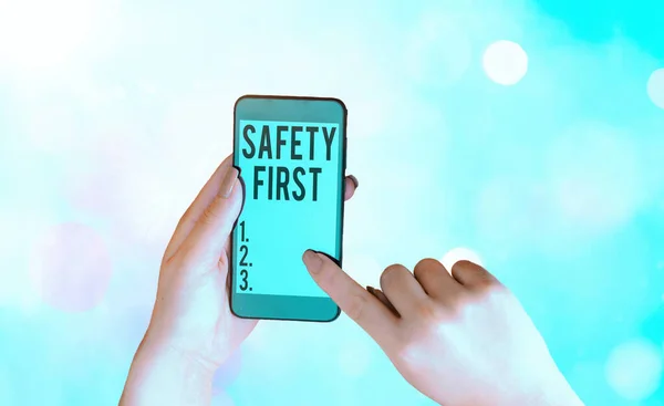 Writing note showing Safety First. Business photo showcasing used to say that the most important thing is to be safe. — Stock Photo, Image