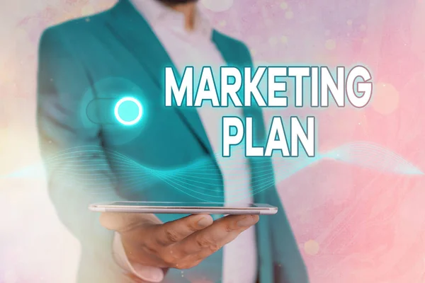 Texto manuscrito Plan de Marketing. Concepto que significa estrategia de negocio global formada que implementarán . — Foto de Stock