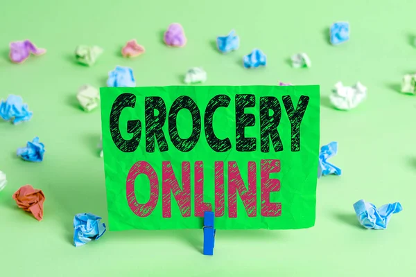 Writing note showing Grocery Online. Business photo showcasing digital version of supermarket accepting online ordering.