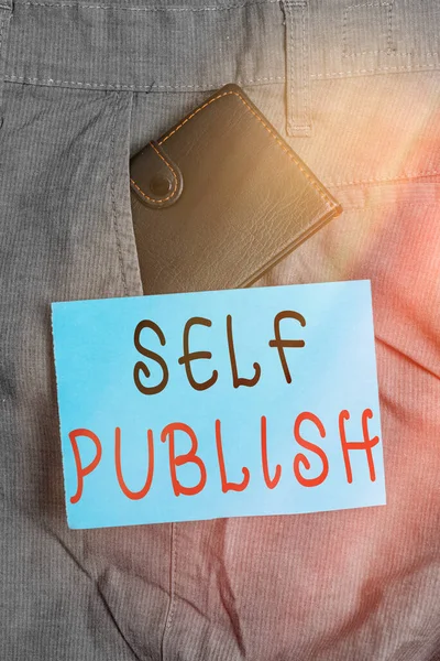 영문 표기는 Self Publish 이 다. ( 영어 ) Publication Write Journalism ( 영어 ) Manuscript Article Facts ( 영어 ) Independent Own Expense ( 영어 ) Small little wallet in man front pocket near notation paper. — 스톡 사진