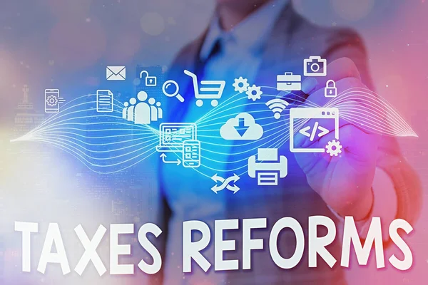 Zapisuje se poznámka zobrazující daňové reformy. Podniková fotografie představující správu vybraných daní v efektivnějším procesu. — Stock fotografie