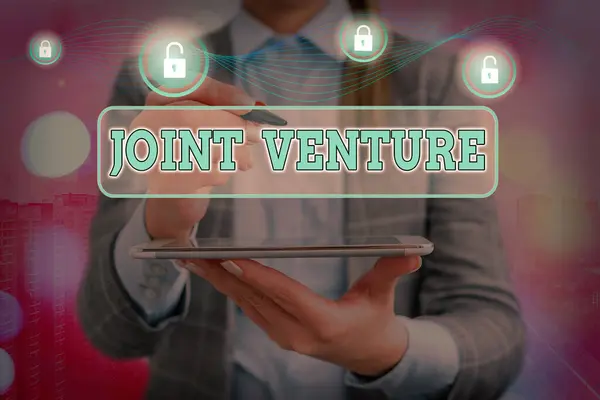 Texto de escritura de palabras Joint Venture. Concepto de negocio para la asociación empresarial invertido conjuntamente por dos o más empresas . — Foto de Stock