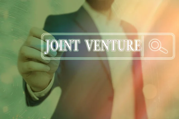 Κείμενο γραφής λέξεων Joint Venture. Επιχειρηματική ιδέα για εταιρική σχέση μεταξύ επιχειρήσεων που επενδύονται από κοινού από δύο ή περισσότερες εταιρείες. — Φωτογραφία Αρχείου