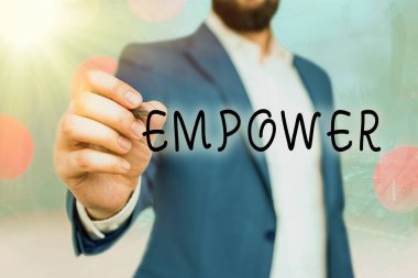 El yazısı metni Empower. Yetki vermek ya da yetki vermek anlamına gelir. Özellikle yasal olarak..