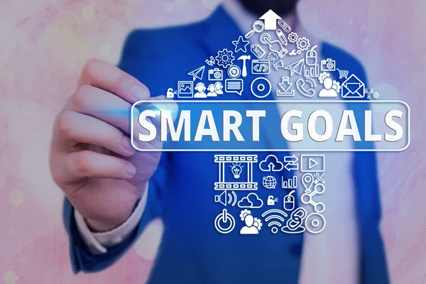 Почерк написания текста Smart Goals. Концепция, означающая мнемонику, используется в качестве основы для постановки целей и направления . — стоковое фото