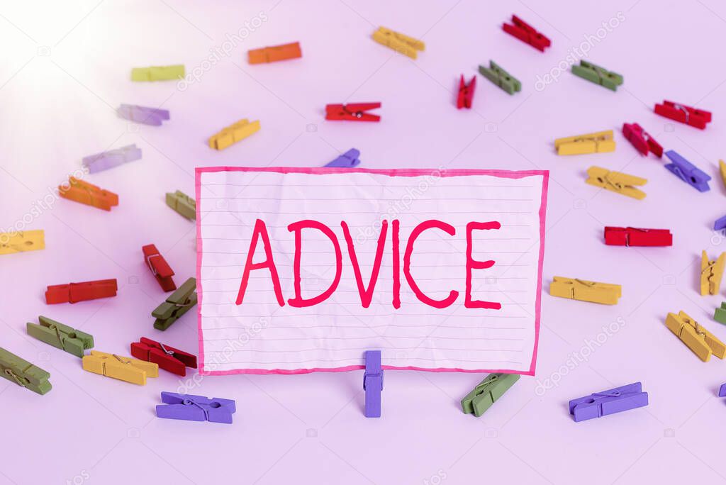 Conceptual hand writing showing Advice. Business photo text recommendation is given regarding a decision or course of conduct Colored clothespin papers empty reminder white floor office.