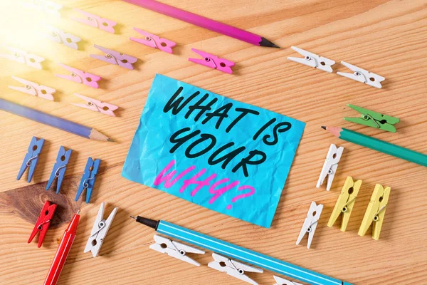 Conceptual hand writing showing What Is Your Why Question. Business photo showcasing asking someone about their purpose in life Colored crumpled papers wooden floor background clothespin. — Stock Photo, Image