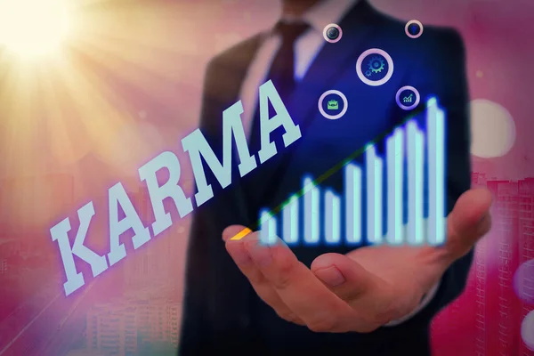 Woord schrijven tekst Karma. Bedrijfsconcept voor de som van individuele acties in deze en vorige bestaansstaten. — Stockfoto