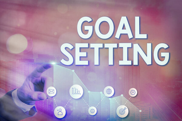 Writing note showing Goal Setting. Business photo showcasing dream big motivational advice or reminder to take action.