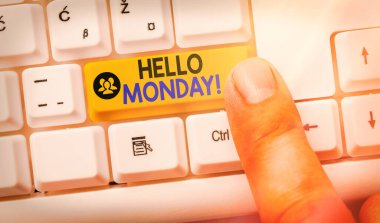 Hello Monday 'i gösteren bir not yazıyorum. İş fotoğraflarının sergilendiği günün ilham verici ilk günü için günaydın..