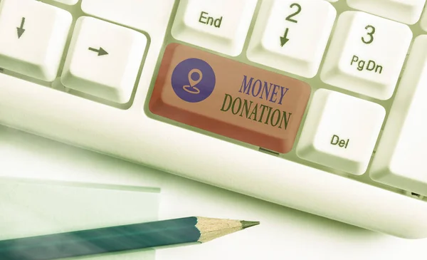 Sinal de texto mostrando doação de dinheiro. Foto conceitual uma ajuda de caridade em uma forma de dinheiro oferecido a uma associação . — Fotografia de Stock