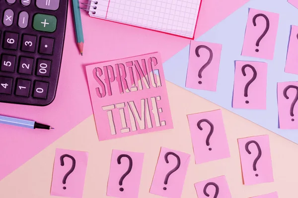 Text sign showing Spring Time. Conceptual photo temperate season of the year identified by a revival of plants Mathematics stuff and writing equipment above pastel colours background.