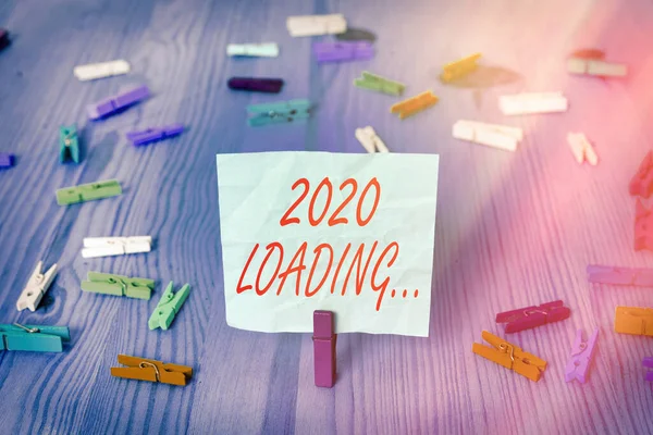 Writing note showing 2020 Loading.... Business photo showcasing a year composed of a series of events that are still ongoing. — Stock Photo, Image