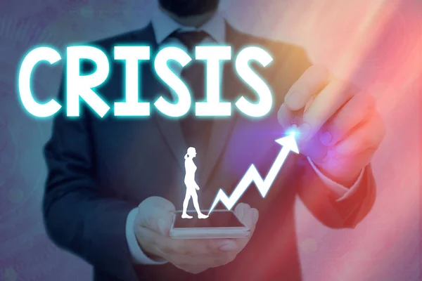 Handschriftliches Textschreiben Crisis. Konzept bedeutet Ereignis, das zu einer instabilen und gefährlichen Situation führen wird. — Stockfoto
