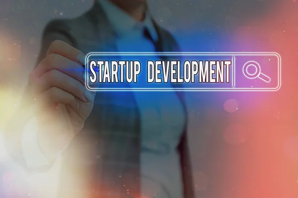 A Startup Development-t bemutató feljegyzés. Üzleti fotó bemutatása fejlődő ötlet, amely jelzi születését az üzleti. — Stock Fotó