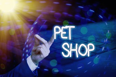 Pet Shop 'u gösteren kavramsal el yazısı. İş fotoğrafı, evcil hayvanları satmaya odaklanan bir perakende satış şirketine mesaj atıyor.
