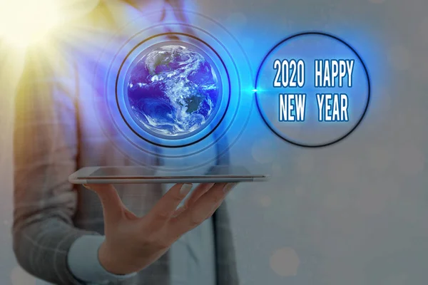 Skriva lapp som visar 2020 Gott Nytt År. Företagsfoto visar firandet av början av kalenderåret 2020 Delar av denna bild som tillhandahålls av NASA. — Stockfoto