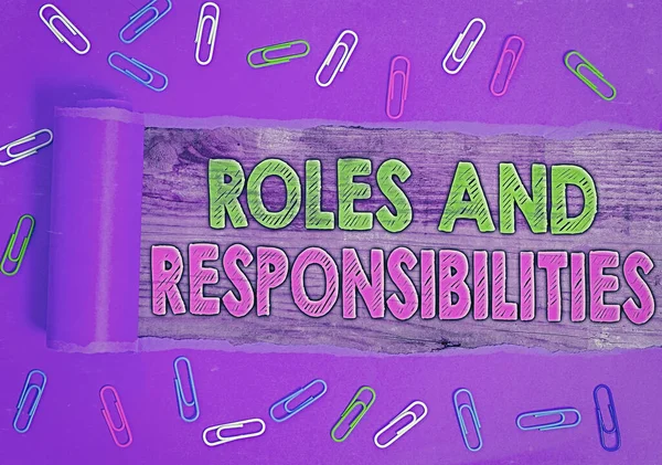 Word writing text Roles And Responsibilities. Business concept for Business functions and professional duties.