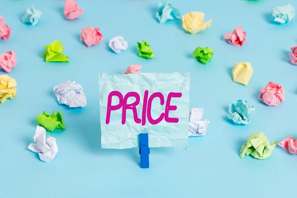 Handwriting text Price. Concept meaning sum of values that customer gives up to gain the benefits of having Colored crumpled papers empty reminder blue floor background clothespin. — Stock Photo, Image