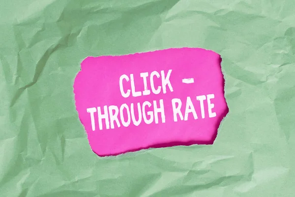 Word writing text Click through Rate. Business concept for number of clicks divide it by impressions equals CTR Green crumpled ripped colored paper sheet centre torn colorful background.