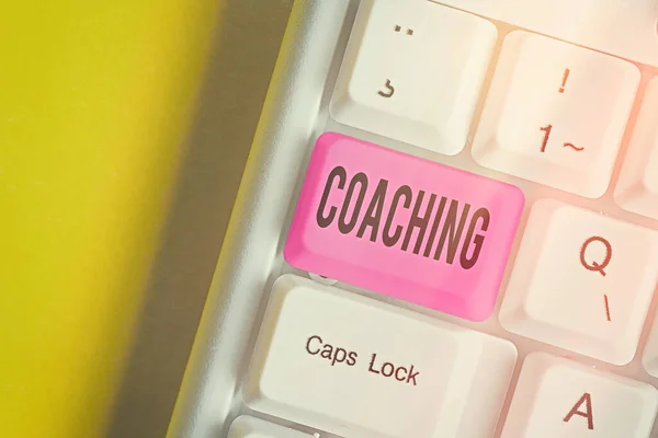 Conceptual hand writing showing Coaching. Business photo showcasing unlocking an individuals potential to maximize their own performance. — Stock Photo, Image
