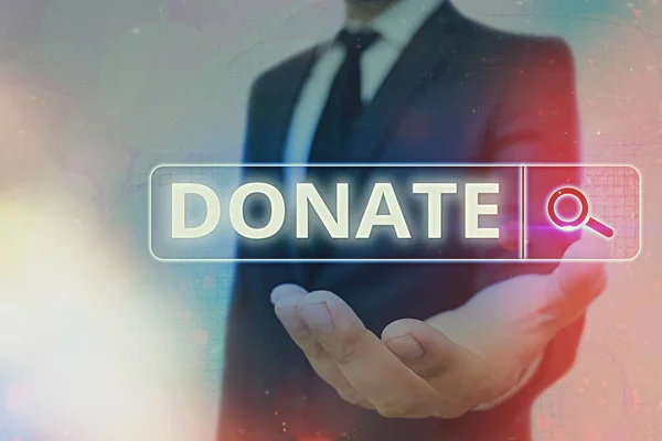 Piszę notatkę z "Donate". Business photo showcasing prezent na cele charytatywne dla dobra sprawy może zaspokoić potrzeby medyczne. — Zdjęcie stockowe