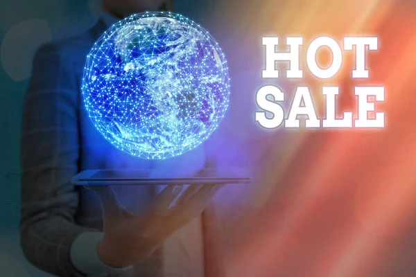 Writing note showing Hot Sale. Business photo showcasing a very good discount of items is displayed over a limited time Elements of this image furnished by NASA.