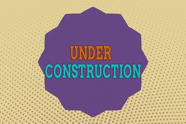 Conceptual hand writing showing Under Construction. Business photo text building that is unfinished but actively being worked on Twelve 12 Pointed Star Dodecagon in Zigzag effect Polygon. — Stock Photo, Image