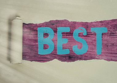 En iyi el yazısı yazarı. Anlamı, bir şeyi ya da bir başkasını aşmak ya da daha iyi olmak için yırtık kartonu ahşap bir masanın üzerine yerleştirmek..