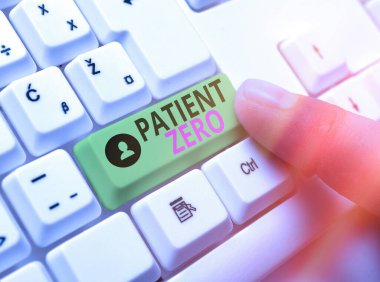 Kelime yazma metni Hasta Sıfır. Yüksek bulaşıcı hastalığın birincil hastalık taşıyıcısı beyaz pc klavye beyaz anahtar kopya alanının üzerinde boş not kağıdı.