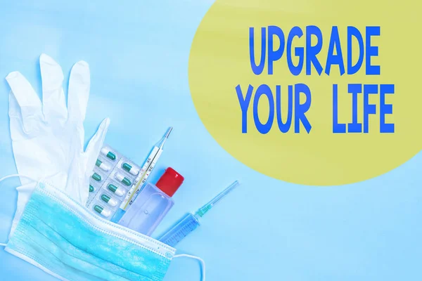 Writing note showing Upgrade Your Life. Business photo showcasing improve your way of living Getting wealthier and happier Primary medical precautionary equipments for health care protection.