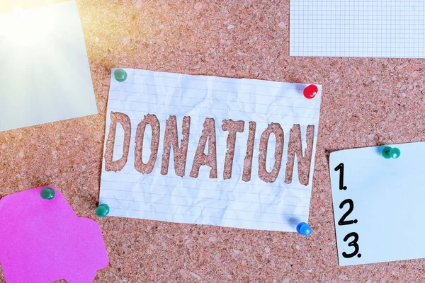 Text sign showing Donation. Conceptual photo the making of a gift especially to charity or public institution Corkboard color size paper pin thumbtack tack sheet billboard notice board. — Stock Photo, Image