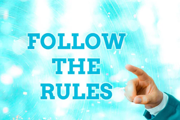 Escrever nota mostrando Siga as regras. Foto de negócios mostrando aprender a conformar-se com a conformidade, regulamentos ou diretrizes . — Fotografia de Stock