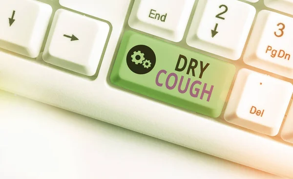 Writing note showing Dry Cough. Business photo showcasing cough that are not accompanied by phlegm production or mucus White pc keyboard with empty note paper above white key copy space. — Stock Photo, Image