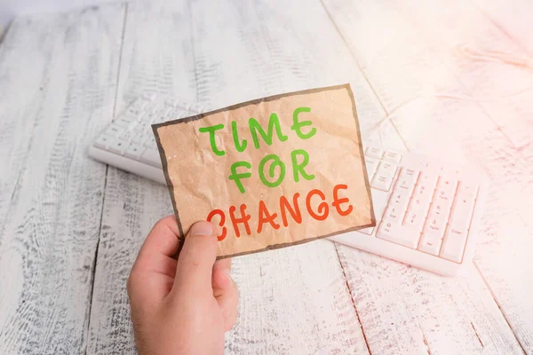 Konceptuální rukopis zobrazující Time For Change. Business photo text take action new beginnings life changing and improvement Man holding colorful reminder square shaped paper wood floor. — Stock fotografie