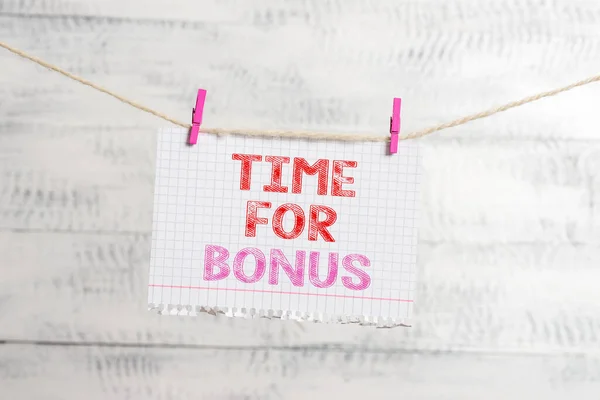 Writing note showing Time For Bonus. Business photo showcasing Limited exclusive offer, extra discounts, crazy deal Clothesline clothespin rectangle shaped paper reminder white wood desk.