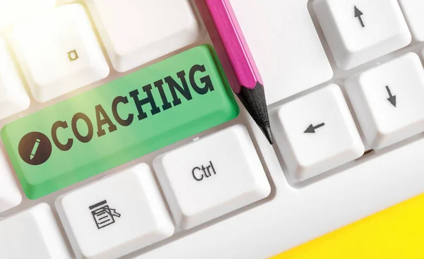 Writing note showing Coaching. Business photo showcasing unlocking an individuals potential to maximize their own performance. — Stock Photo, Image