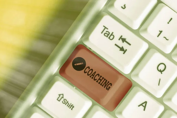 Text sign showing Coaching. Conceptual photo unlocking an individuals potential to maximize their own performance. — Stock Photo, Image