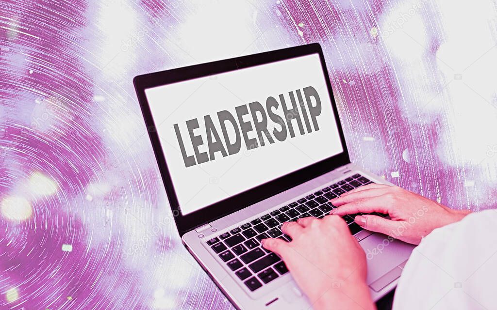 Handwriting text writing Leadership. Concept meaning art of motivating to act toward achieving a common goal Modern gadgets with white display screen under colorful bokeh background.