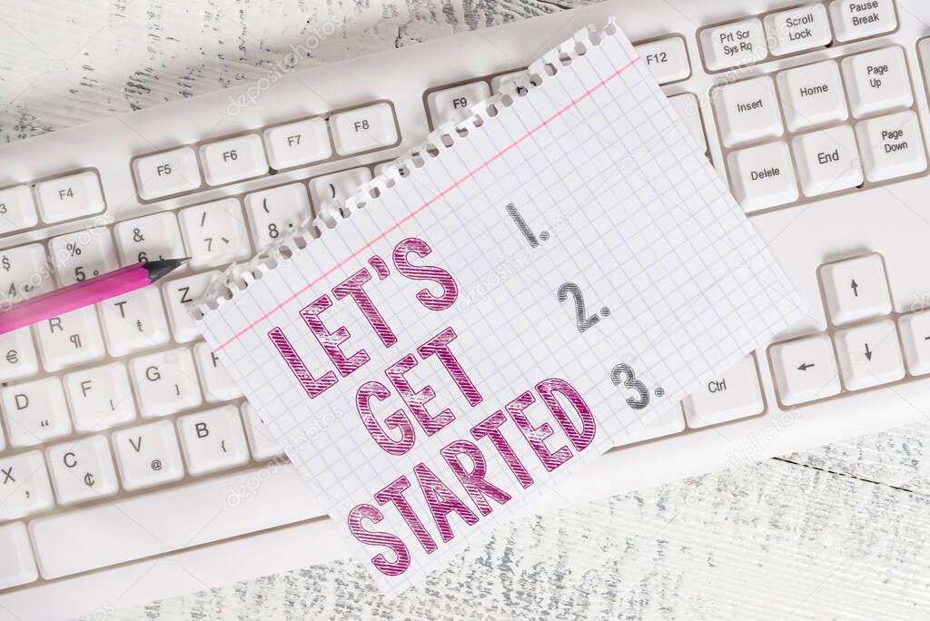 Writing note showing Lets Get Started. Business photo showcasing encouraging someone to commence or begin doing something Keyboard office supplies rectangle shape paper reminder wood.