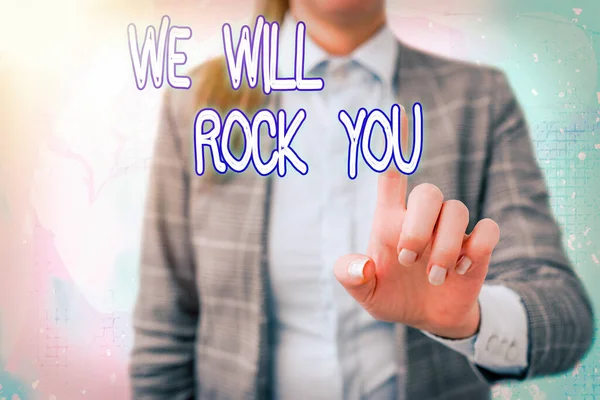 Handwriting text writing We Will Rock You. Concept meaning to be going out and facing the world and all that is in it Touching screen digital application marking important details in business.