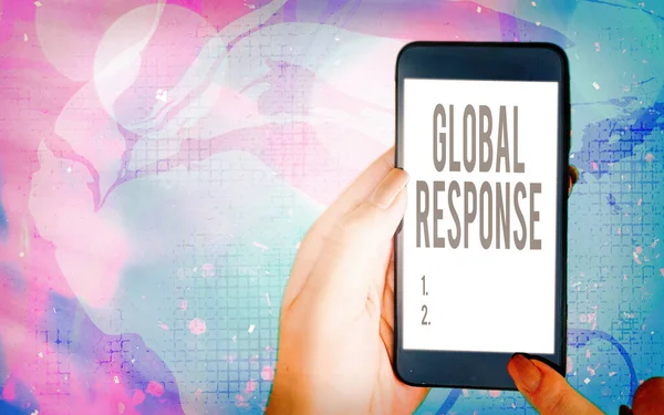 Word writing text Global Response. Business concept for indicates the behaviour of material away from impact point Modern gadgets with white display screen under colorful bokeh background.