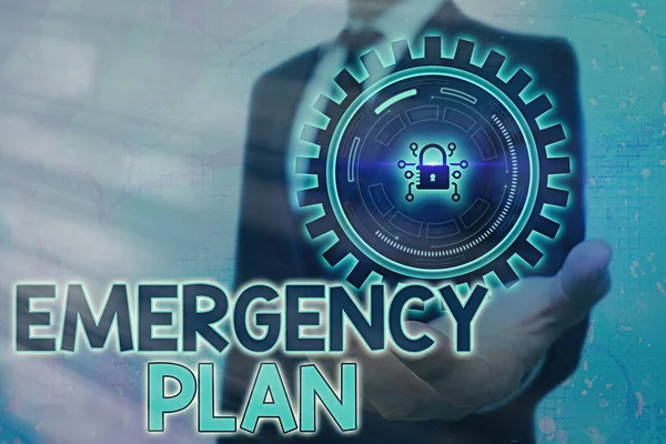 Writing note showing Emergency Plan. Business photo showcasing instructions that outlines what workers should do in danger Graphics padlock for web data information security application system.