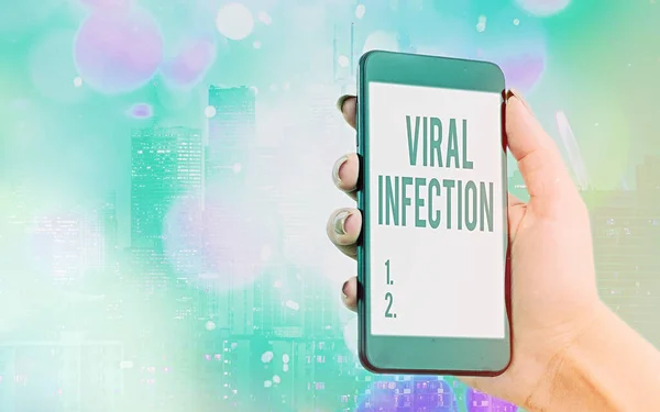 Writing note showing Viral Infection. Business photo showcasing Specific attack of the cells from the reproduction of harmful virus Modern gadgets white screen under colorful bokeh background.