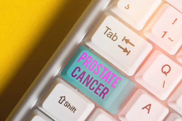 Text sign showing Prostate Cancer. Conceptual photo development of cancer in the male reproductive system White pc keyboard with empty note paper above white key copy space. — Stock Photo, Image