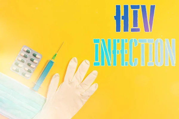 Word writing text Hiv Infection. Business concept for A disease of the immune system due to the infection of HIV Primary medical precautionary equipments for health care protection.