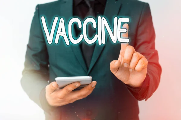 Schrijfbriefje met vaccin. Zakelijke foto presentatie voorbereiding van gedode micro-organismen of levende verzwakte organismen Model met wijzende hand vinger symboliseren navigatie vooruitgang groei. — Stockfoto