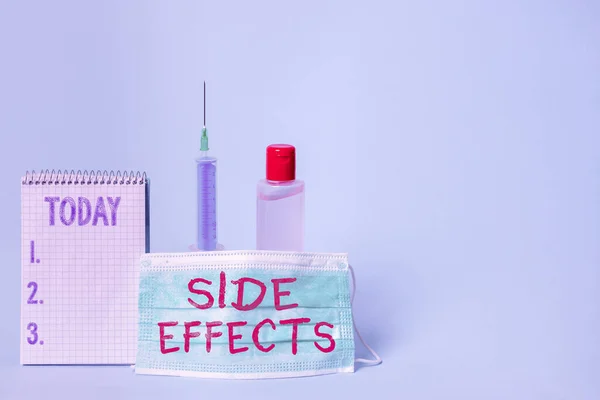 Text sign showing Side Effects. Conceptual photo Typically undesirable effect of a drug or medical treatment Set of medical equipment with notepad for health condition assessment.