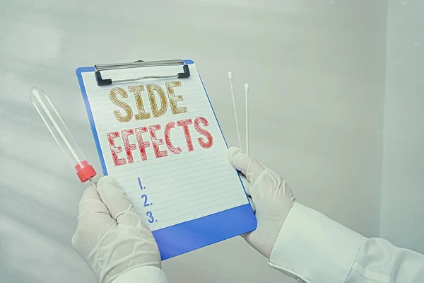 Text sign showing Side Effects. Conceptual photo Typically undesirable effect of a drug or medical treatment Laboratory blood test sample shown for medical diagnostic analysis result.