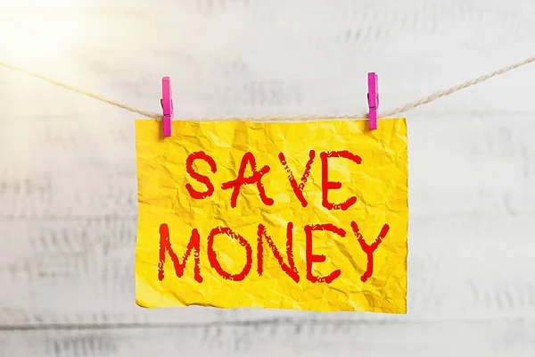 Word writing text Save Money. Business concept for to budget or put money aside for the future or emergency Clothesline clothespin rectangle shaped paper reminder white wood desk. — Stock Photo, Image